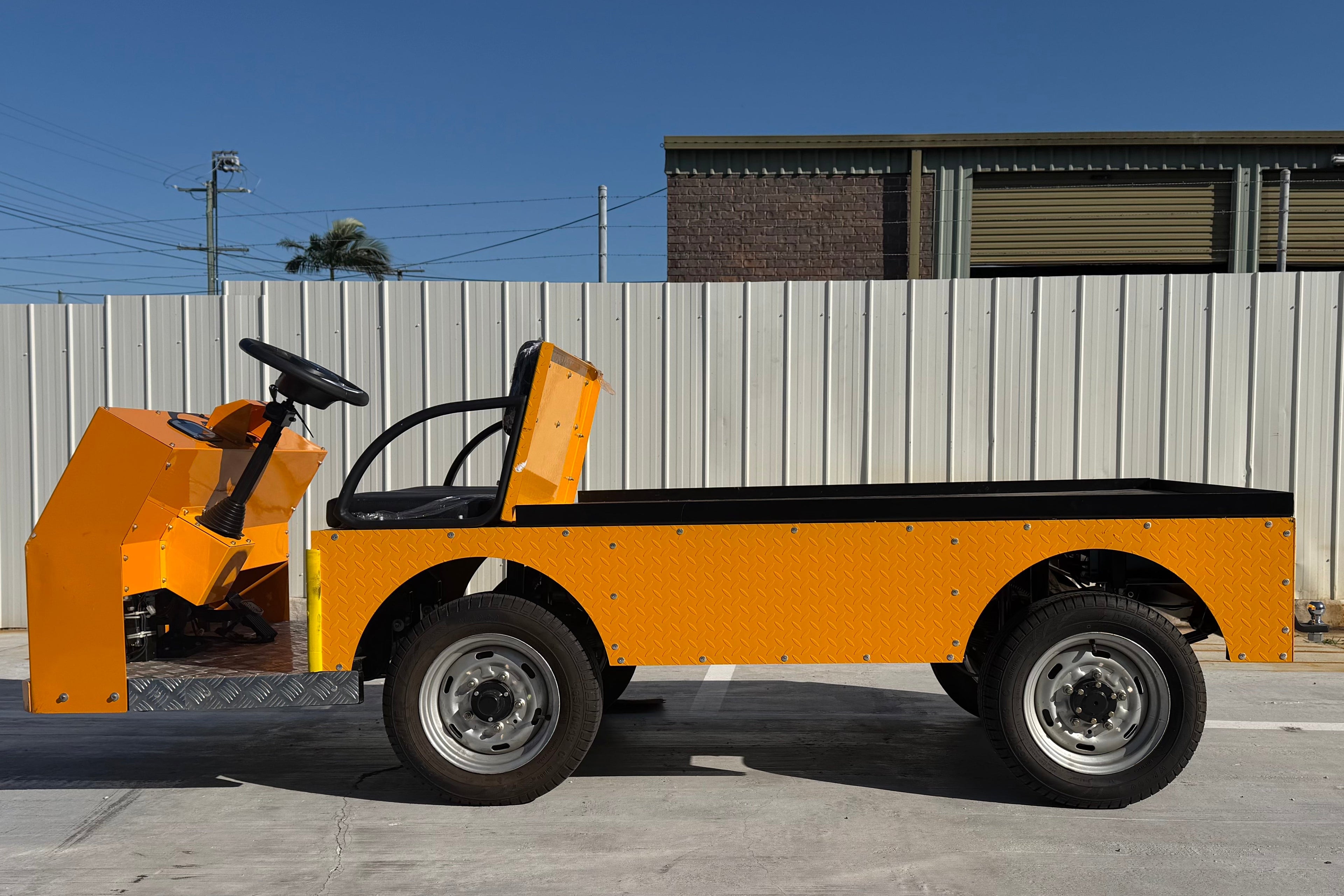 Heavy-Duty Electric Flatbed Cart for Industrial Transport