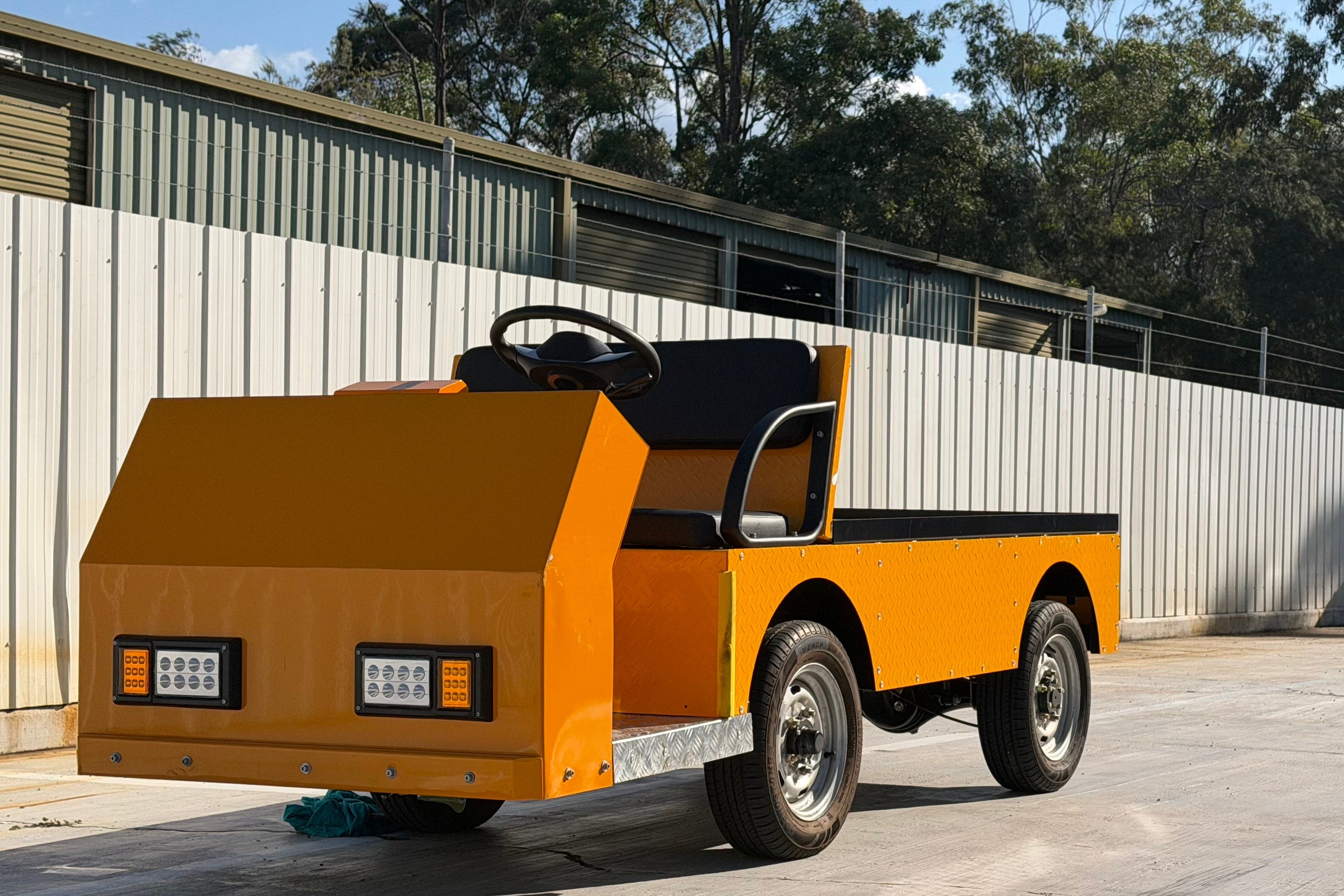 Heavy-Duty Electric Flatbed Cart for Industrial Transport